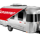 A photo of the exterior of the Supreme-branded Airstream